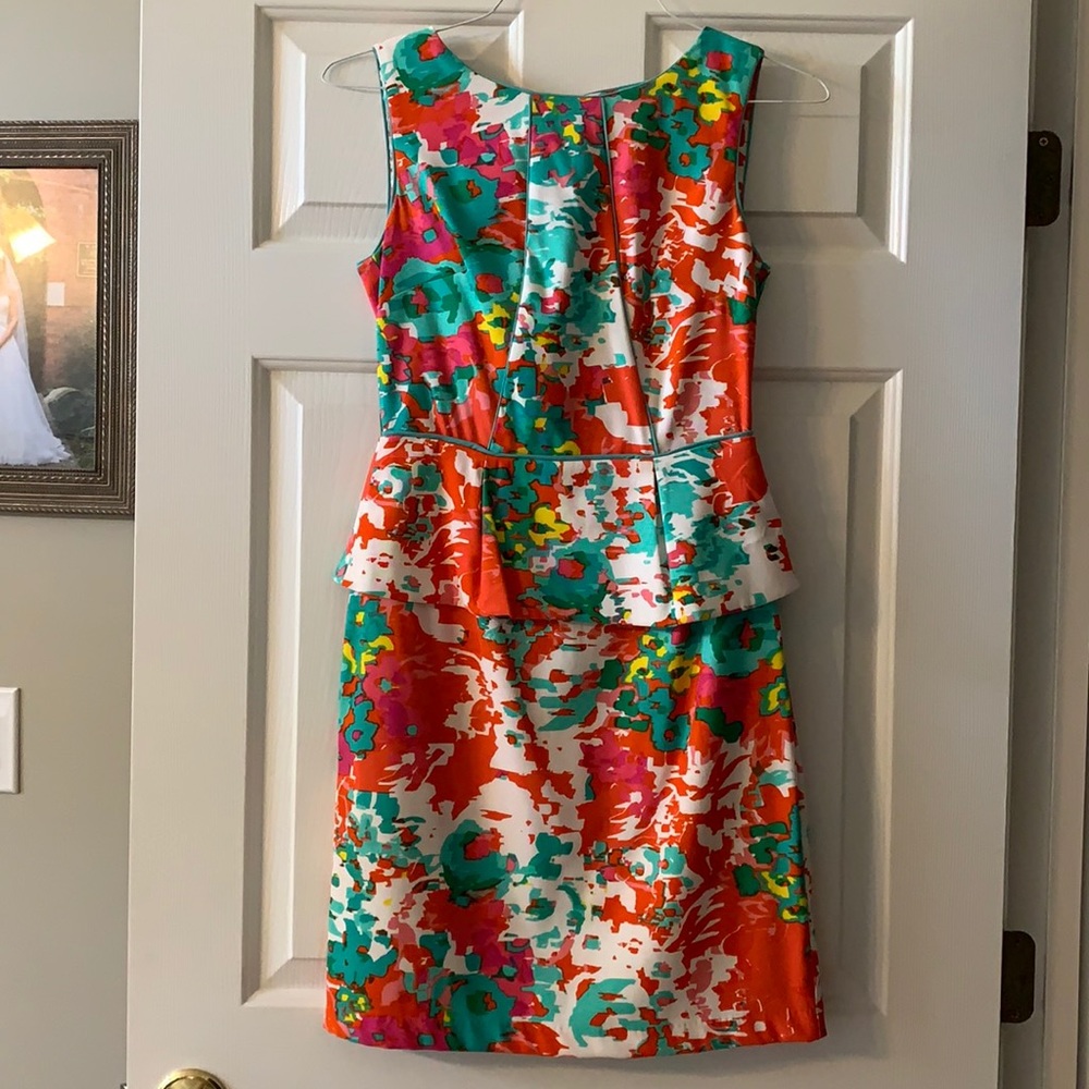 Fun and flattering peplum dress by AGB.